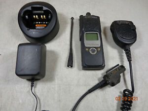 The complete Motorola XTS5000 Mdl II P25 Radio with 700/800 frequency and H18UCF9PW6AN model, including a speaker mic.