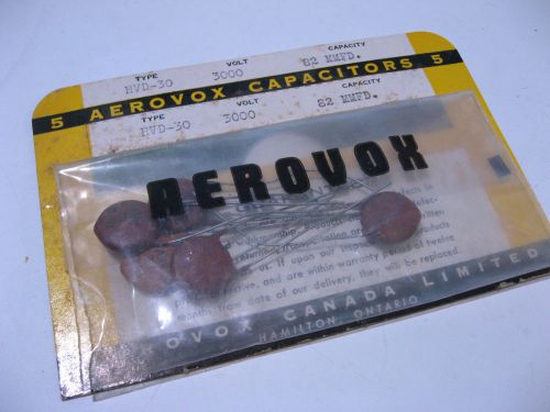 Five pieces of vintage NOS Aerovox HVD-30 capacitors with a capacitance of 82MMFD and a voltage rating of 3000 volts.