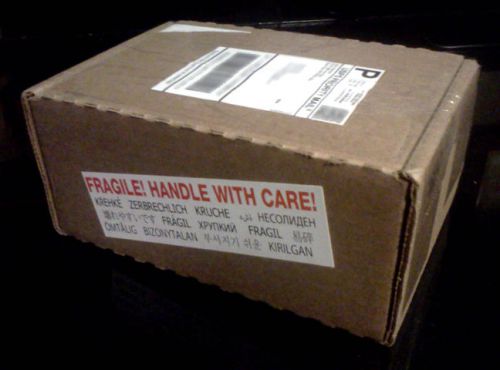 Pack of 50 shipping/mailer sticker decals for fragile items. Handle with care.