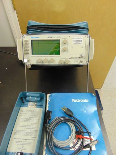 The FU36 is a Metallic Time Domain Reflectometer by Tektronix, which includes a manual and accessories such as 1502C.