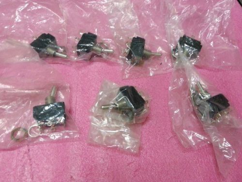 Seven pieces of CUTLER HAMMER C-H Toggle Switch with a 1HP capacity and a voltage rating of 120/240VAC, model 0409.