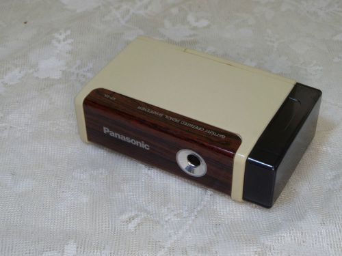 Battery-operated vintage wood grain Panasonic pencil sharpener KP-2A.
